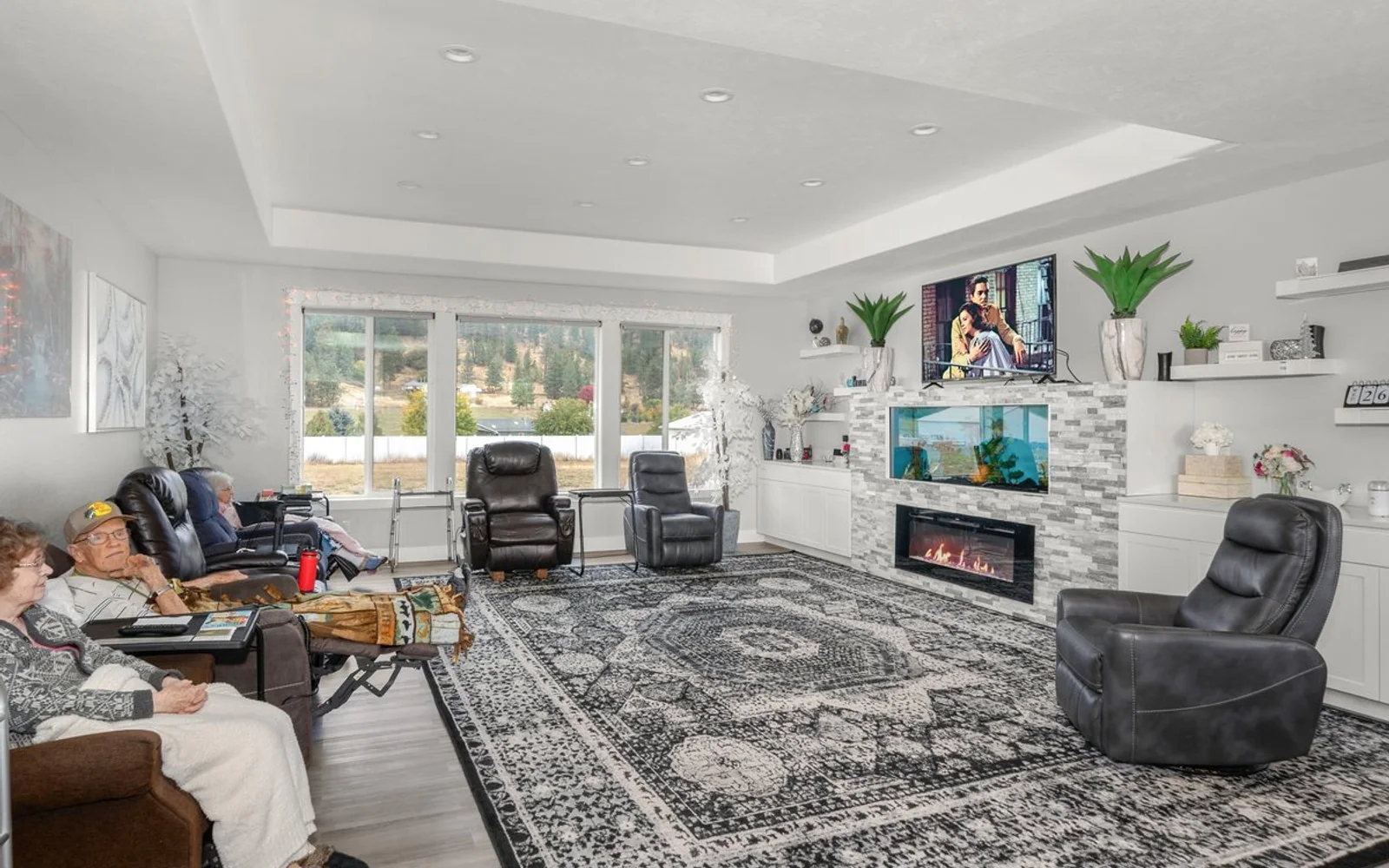 Shared living room with reclining chairs at A+ Quality Adult Family Home